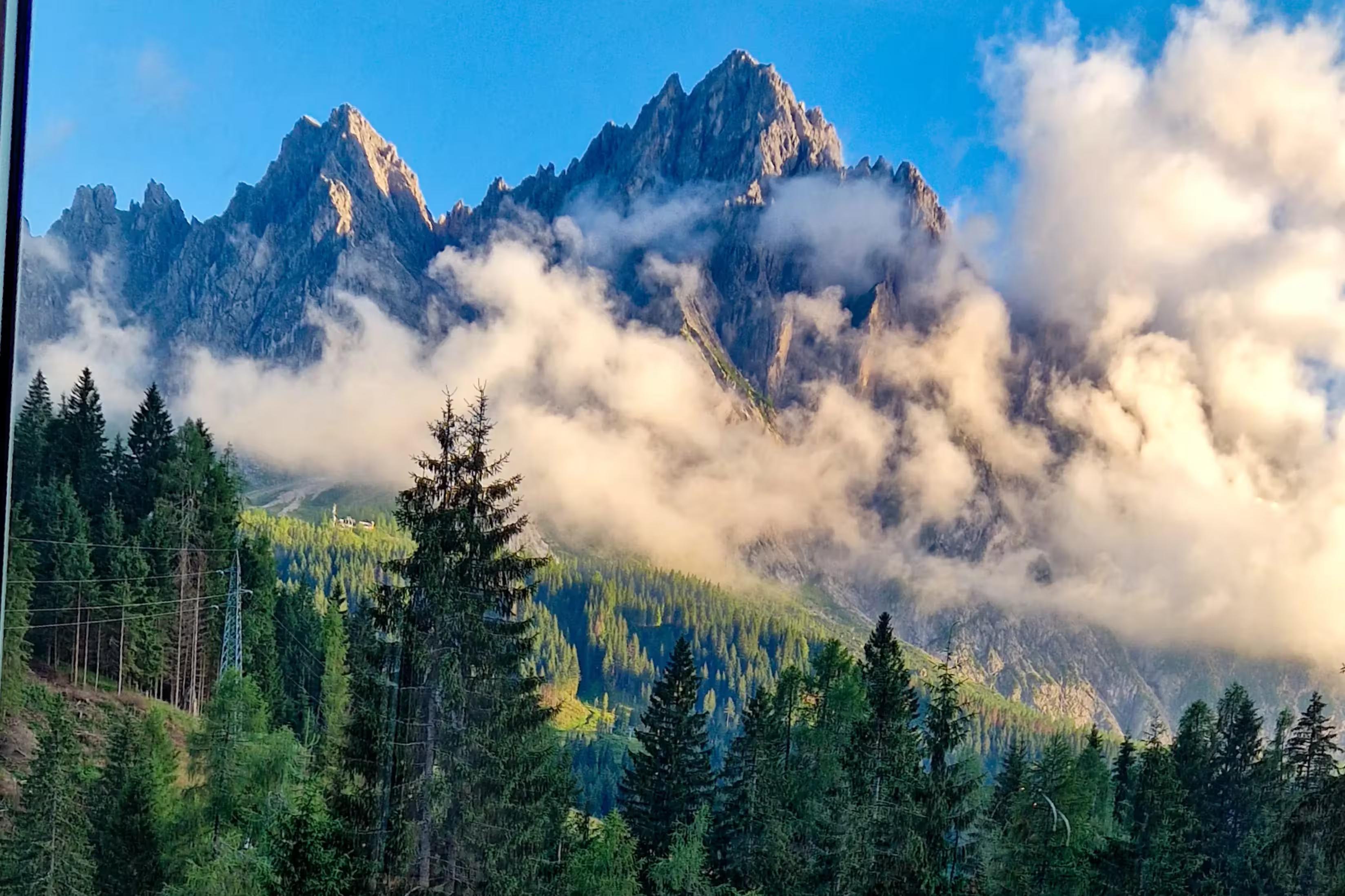 A journey into nature among the mountains in Sappada, in the Dolomites